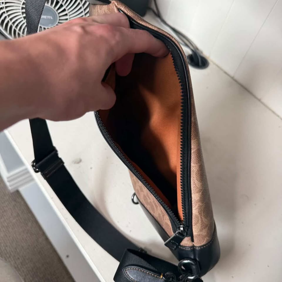 COACH DOMINIC SLING BAG