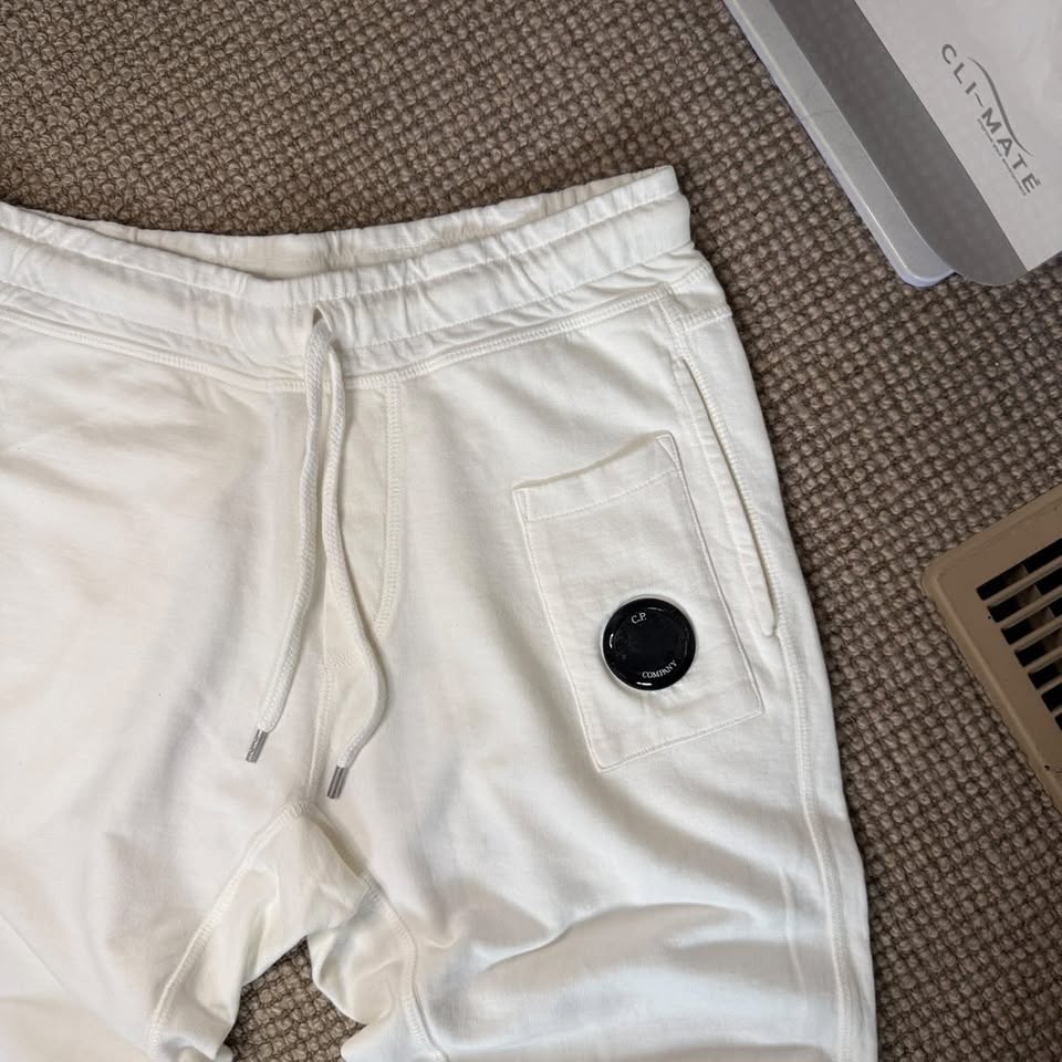 CP COMPANY TRACKSUIT PANTS (XS)